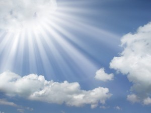 sun-rays-coming-out-of-the-clouds-in-a-blue-sky