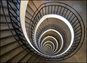 A spiral staircase representing repressed karma. 